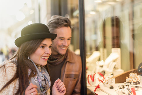 Couple Picking Out Diamond Engagement Ring