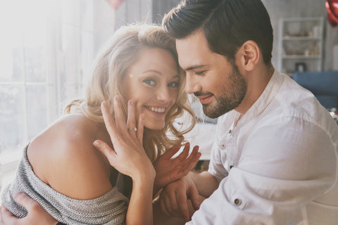 Couple Showing Engagement Ring