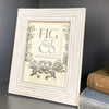 White distressed carved wood picture frame, fits 5" x 7" photos