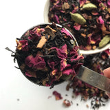 A measured tablespoon of Shanti Chai & Co's Rose Petal Chai, ready to make chai to be iced! 