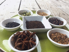 Some of the whole spices that make up masala chai include star anise pods, cinnamon, cardamom, ginger, black peppercorns, cloves and more. This masala is combined with black loose leaf tea, often Assam tea. 