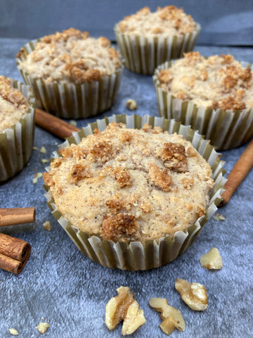 keto cinnamon streusel muffins cooling on a baking rack