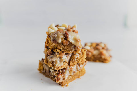 Keto pumpkin spice magic bars in a stack of 3