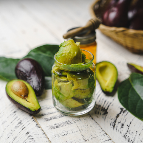 avocados in a jar on the counter