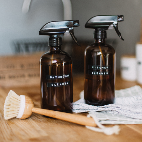 bottles of toxin free cleaners on kitchen counter