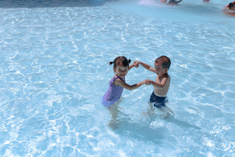 kids swimming in the pool