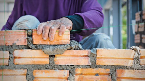 Bricklayers and Home Builders: Developing Communities with Dedication and Expertise