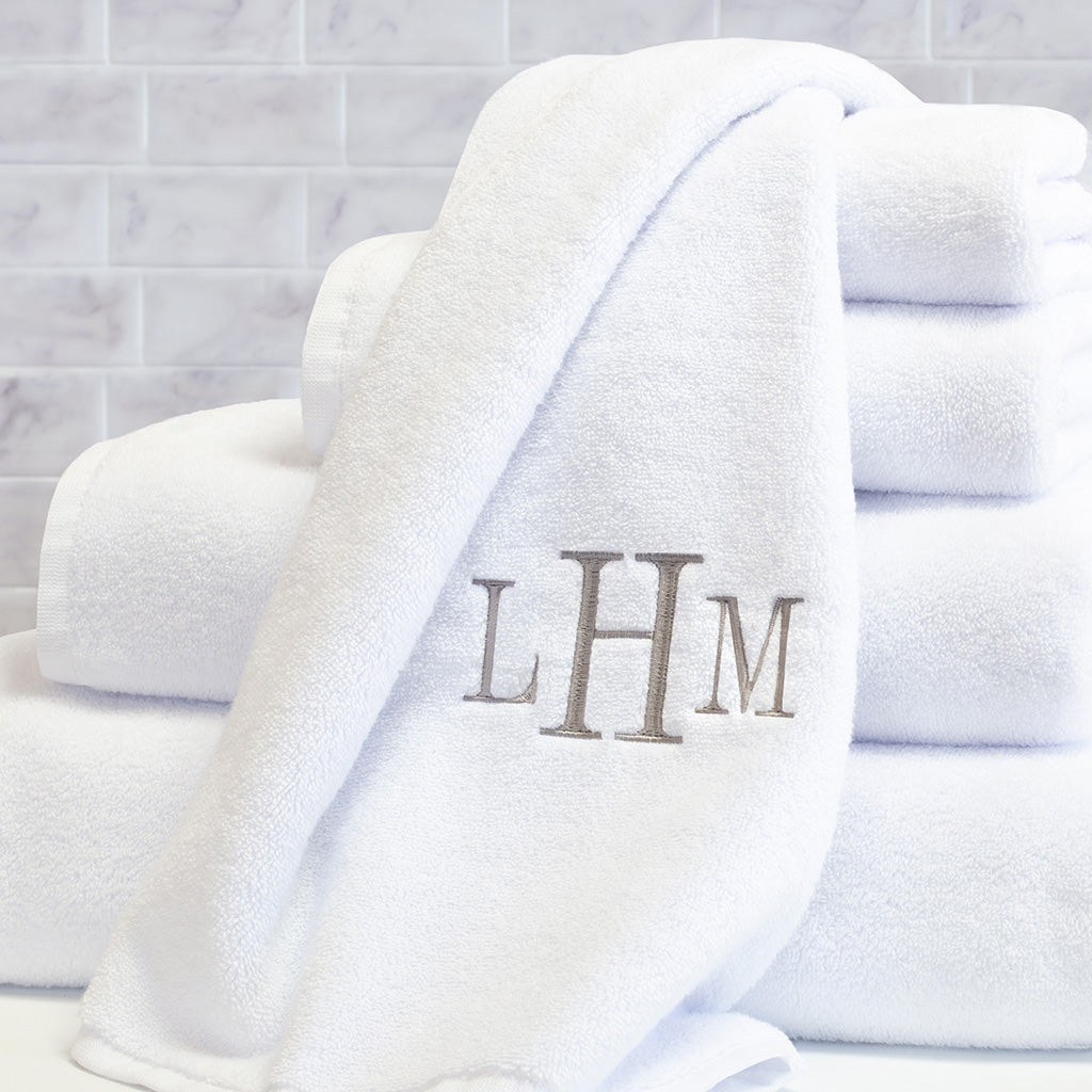 gray and white bath towels