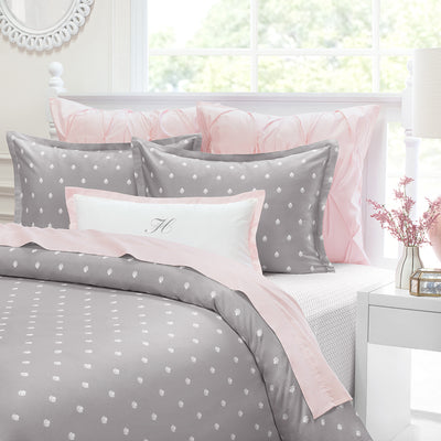 pink and grey pillows