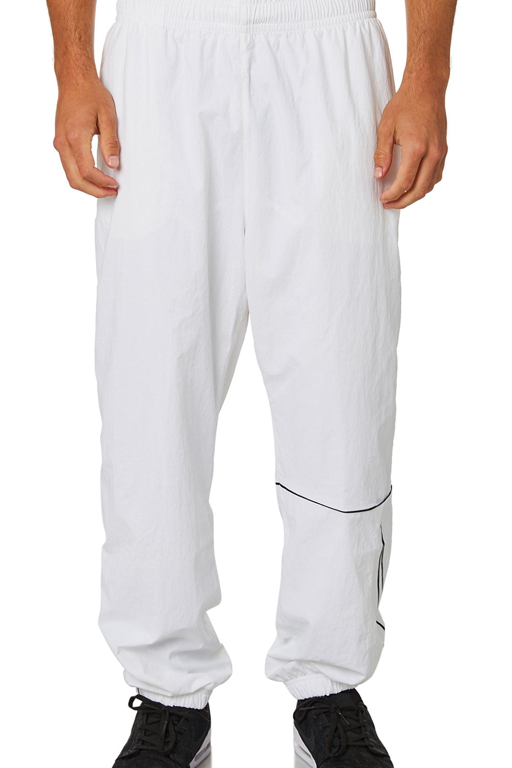 white baggy track pants