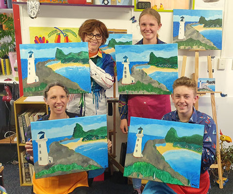 Happy painters with their finished Castlepoint paintings