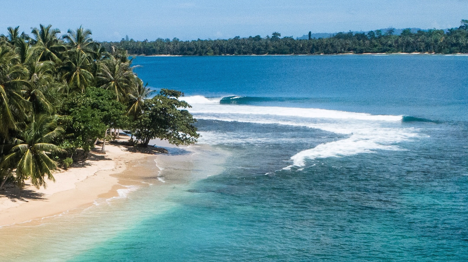 Aerial photo of the ocean and distant islands in Mentawai, Indonesia