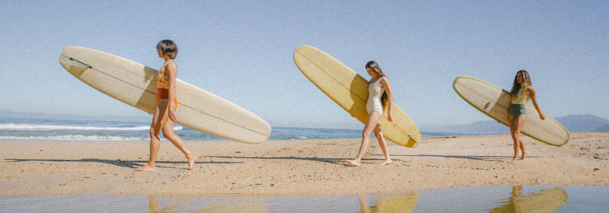 women surfing surf beach swimsuit Mexico surf trip walk longboard