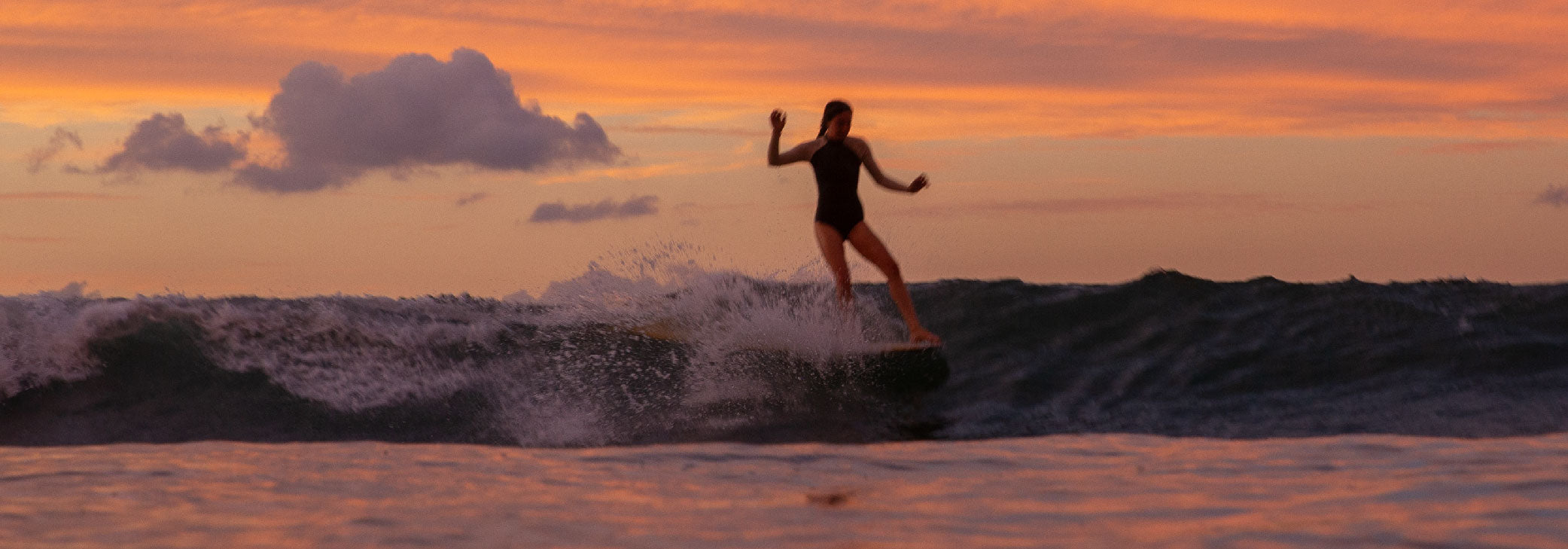 surf longboard Mexico sunset women surf suit black white