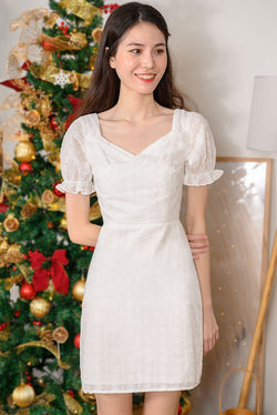 Lisa Puff Sleeve Eyelet Dress #MadeByDearLyla (White Eyelet) The puffy frill sleeves and elegant fold details at the overlap neckline adds a touch of femininity and vintage vibes to this classy piece. It's cut from embroidery cotton with intricate stunning eyelet details, which brings you from work to play comfortably. You won't go wrong with this dress this festive season.  - Concealed back zip closure - Lined - Made of embroidery cotton  Available in White Eyelet and Navy Eyelet.