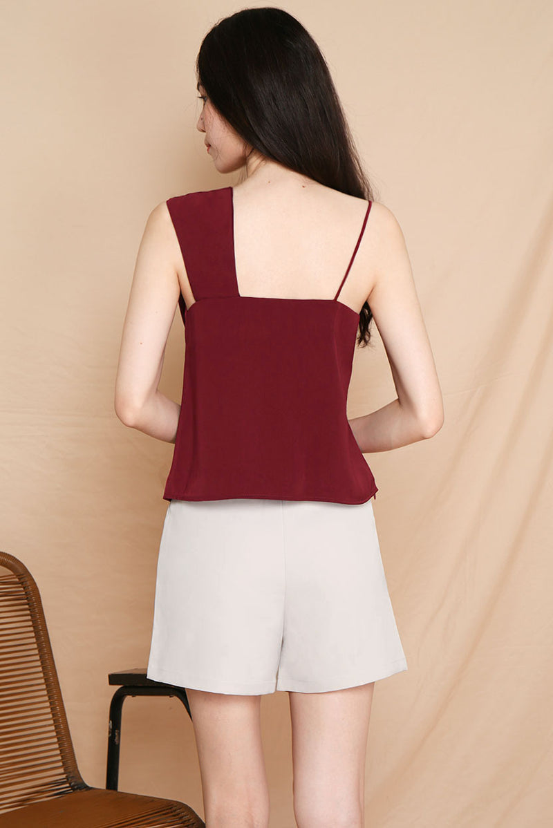 Merry Fold Top #MadeByDearLyla (Maroon) Elevate your look with our Merry Fold Top which makes you look effortlessly chic even if you dress down in a pair of jeans. This unique piece would definitely make you stand out. A refreshing addition to your wardrobe.  - Concealed side zip closure - Lined - Made of polyester  Available in Maroon and White.  Exclusively manufactured by Dear Lyla.  Pair with our Mistletoe Flowy Slit Pants or our upcoming Tracey Tailored Shorts (Sand) to complete the look 