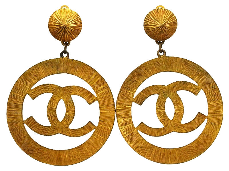 Vintage Chanel earrings sunburst CC logo dangle | Vintage Five