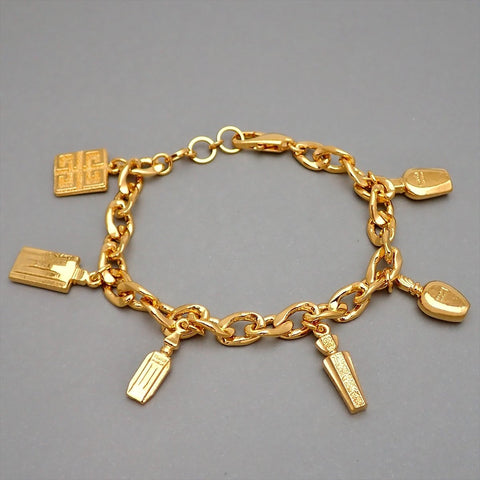 Authentic Vintage Givenchy bracelet 4G logo perfume bottles | Vintage Five