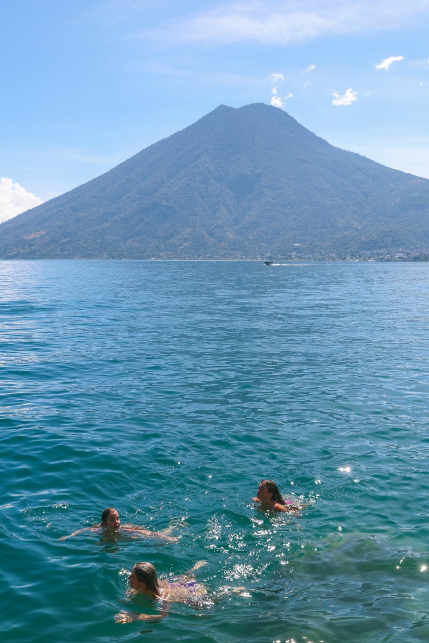 Baggage Girls swimming in San Marco lake Guatemala