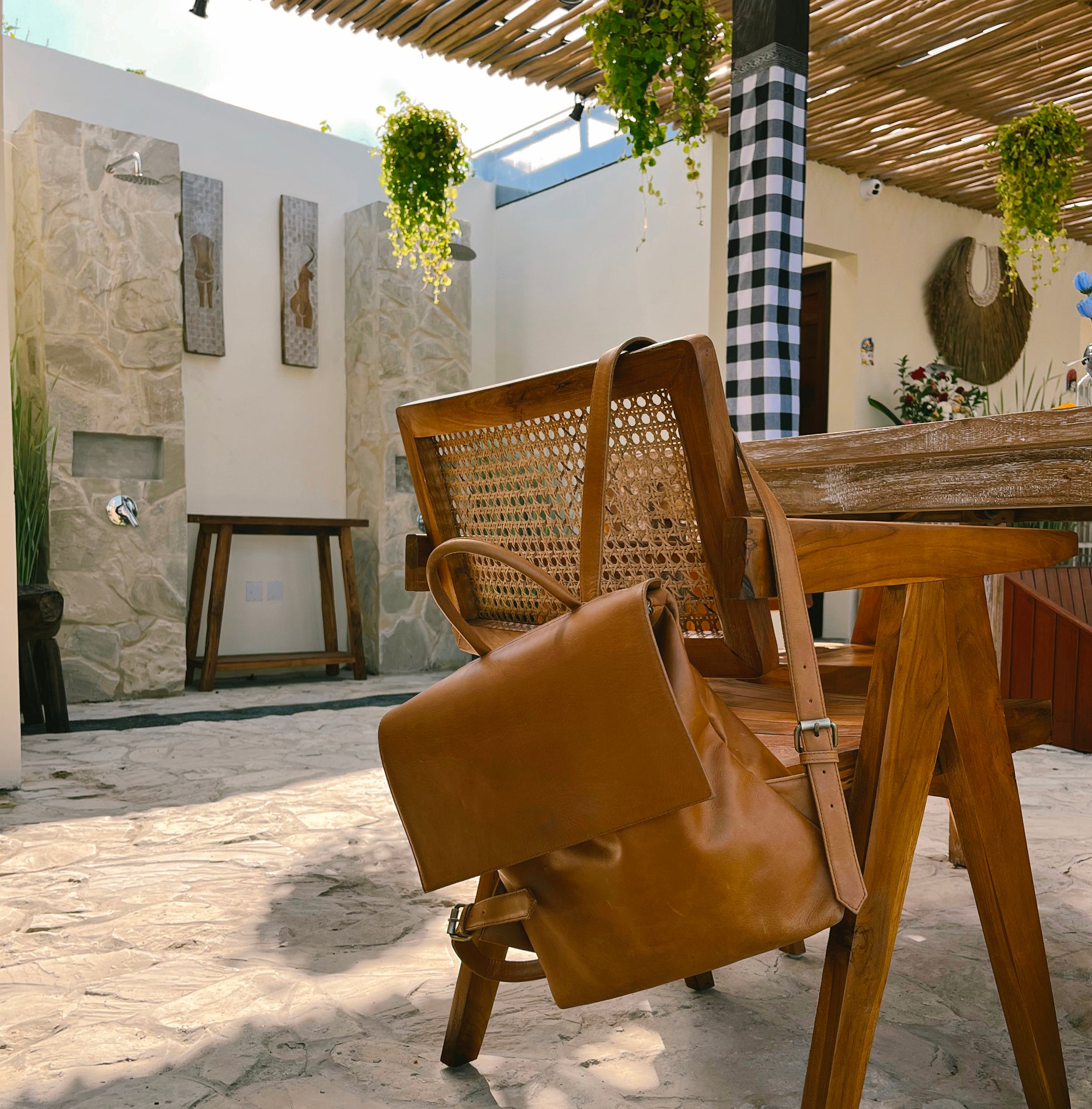 Vintage Tan Bradley Backpack in Bali cafe