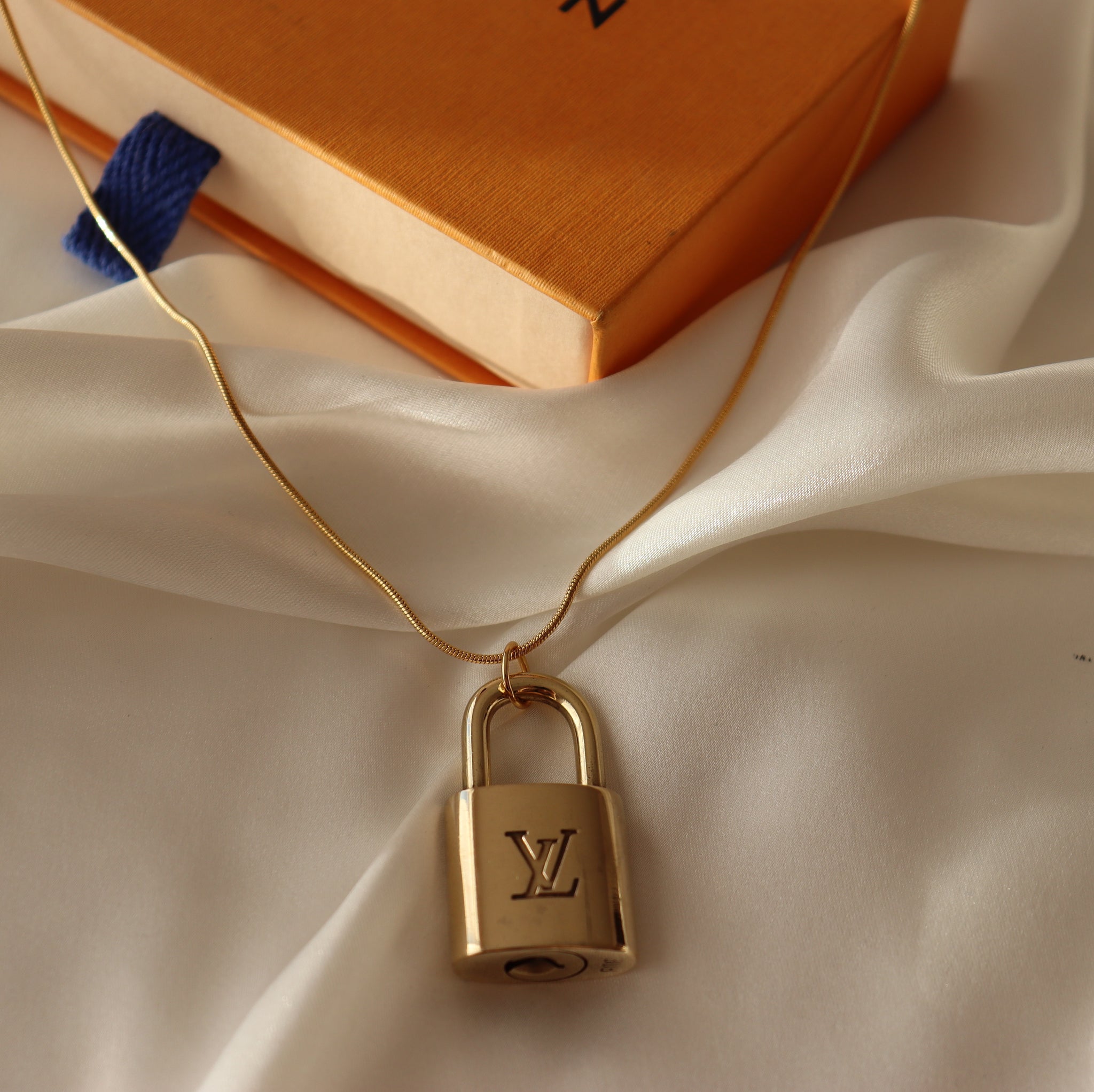 louis-vuitton-lock-and-key-on-gold-tone-necklace-www-recon-co-id