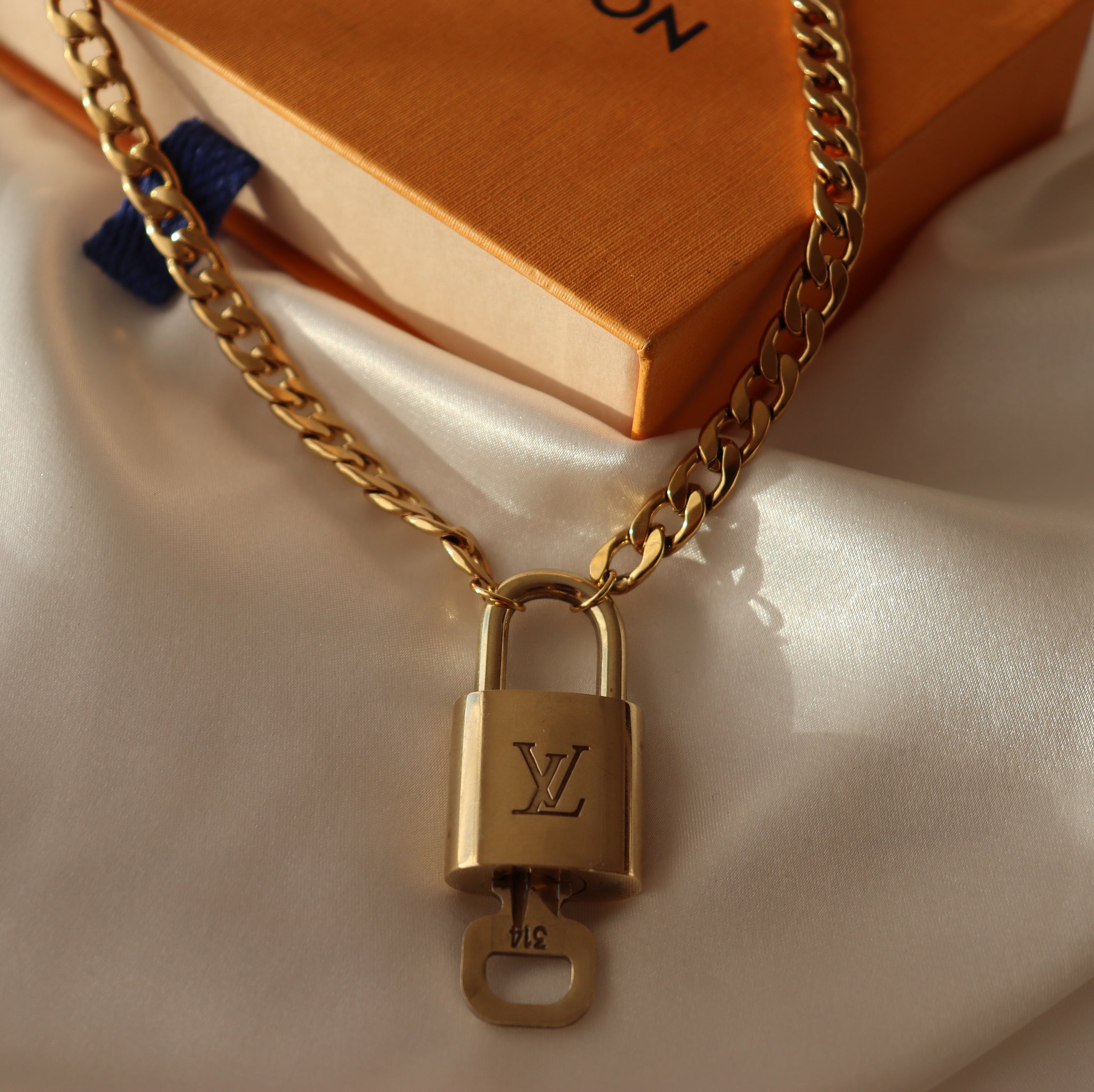 Lock With Key on Necklace Relic the Label