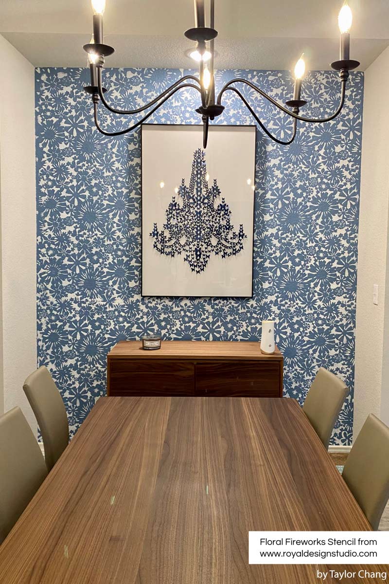floral stencil on dining room wall in blue