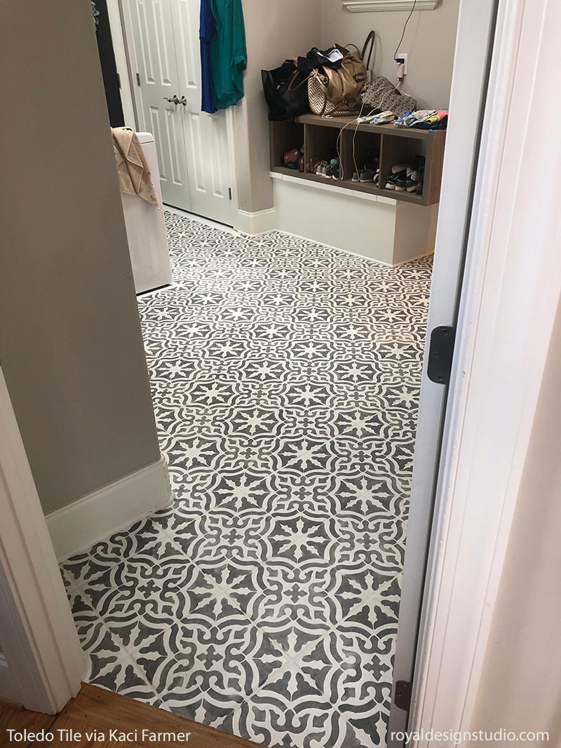 Painted and stenciled ceramic bathroom floor tile