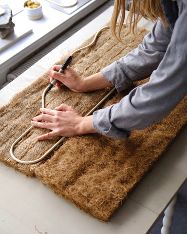 Draw the shape on the back of the coco coir fabric