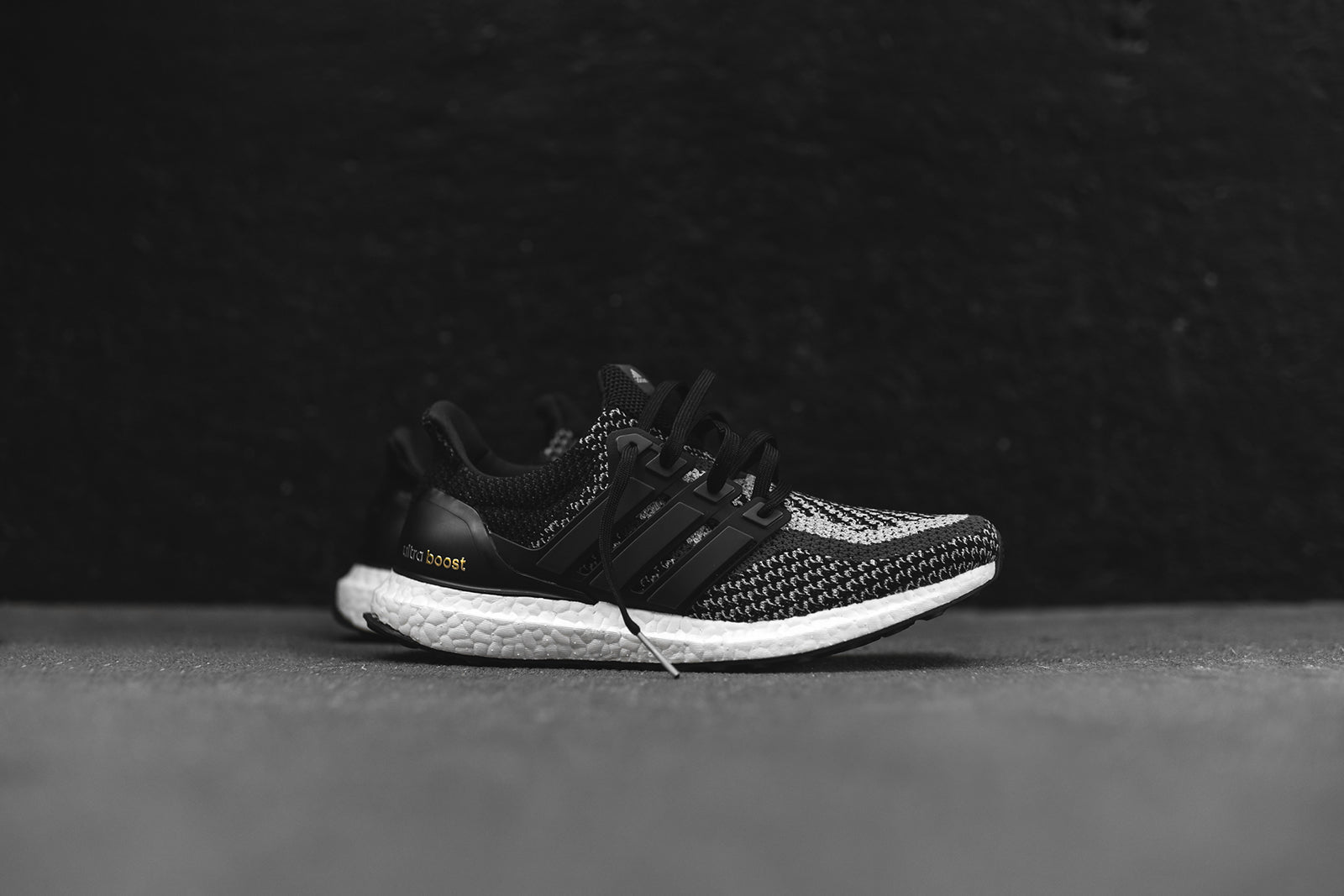 ultra boost black reflective