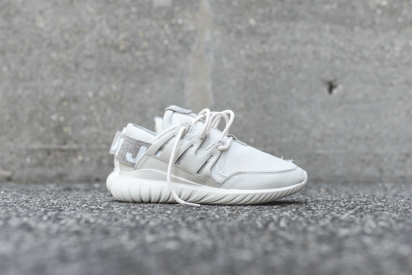 slam jam x adidas tubular nova