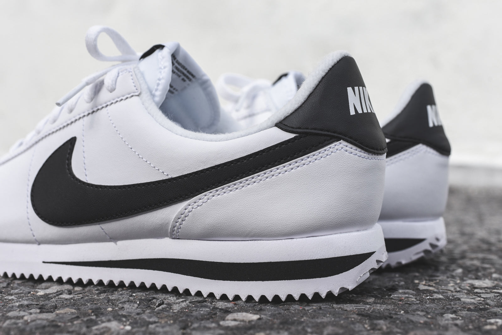 nike cortez mens white black