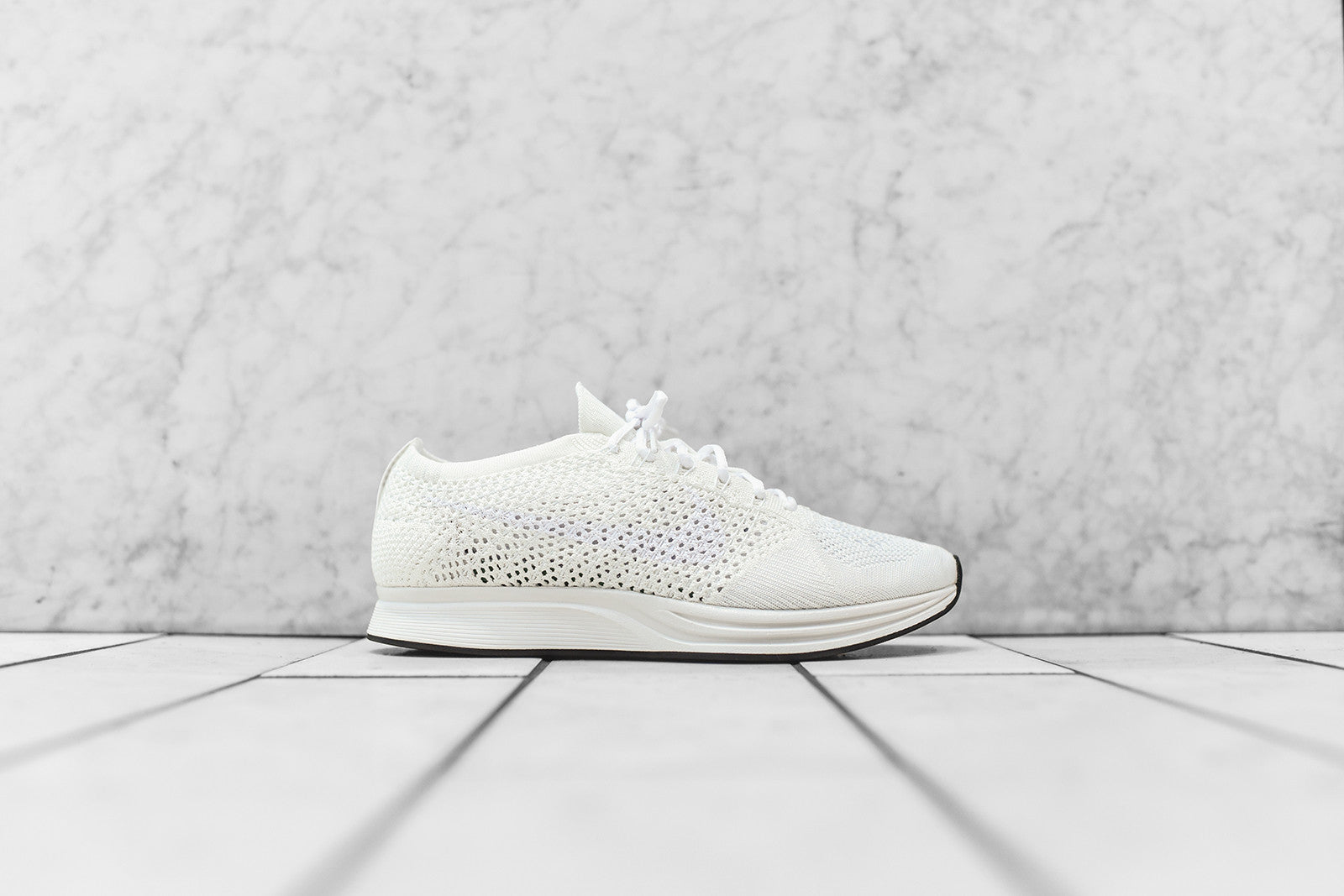 flyknit racer triple white