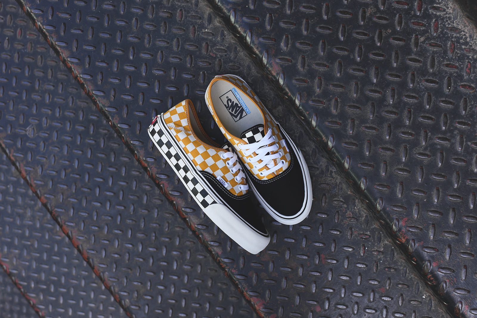 checkered and sunflower vans