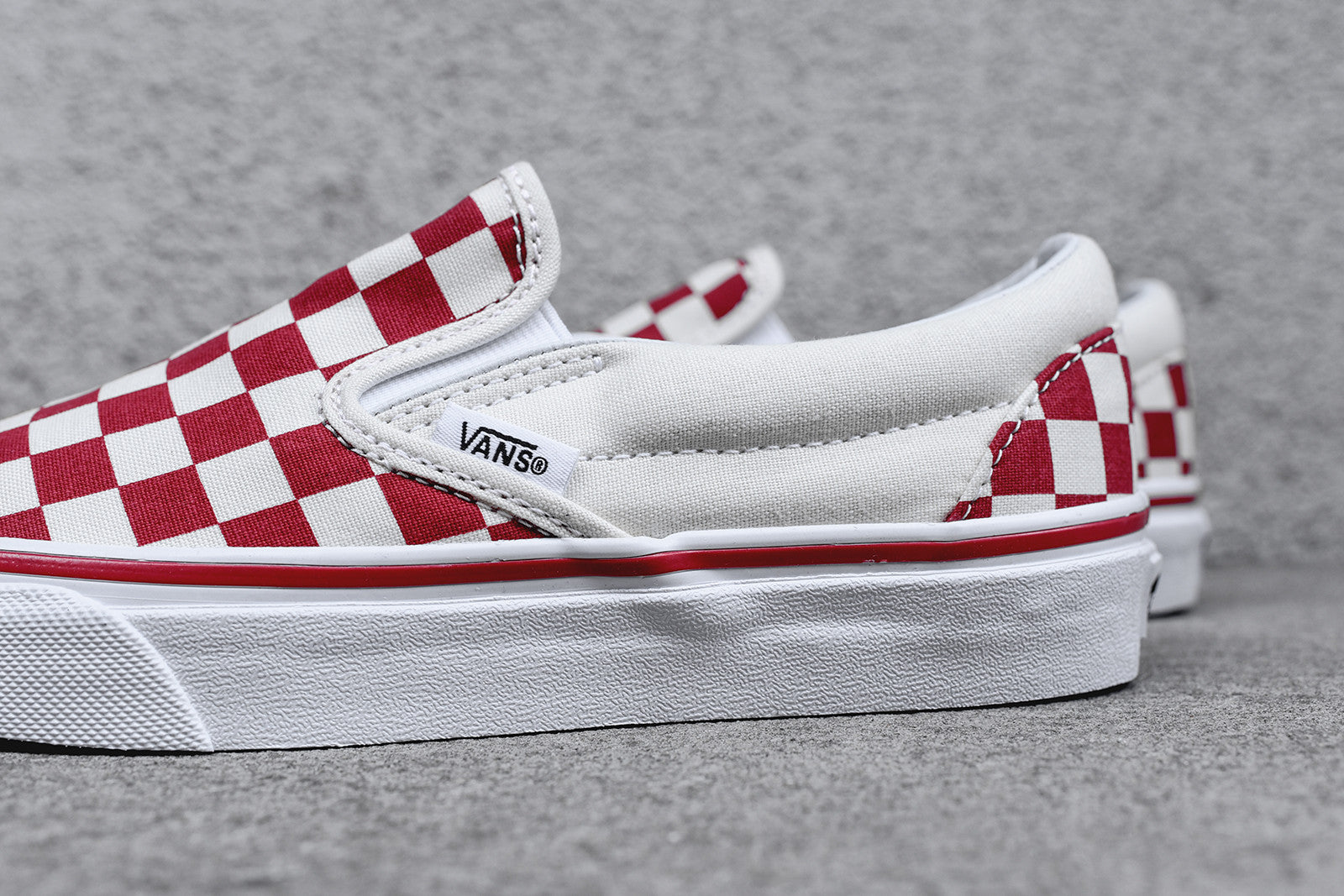 vans red and white slip on