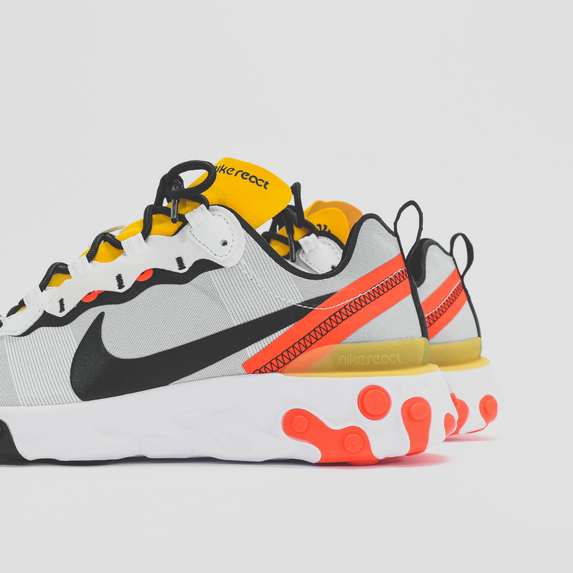 nike react white and yellow