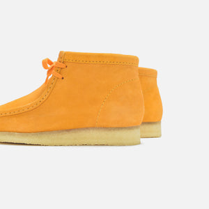 yellow clarks wallabees