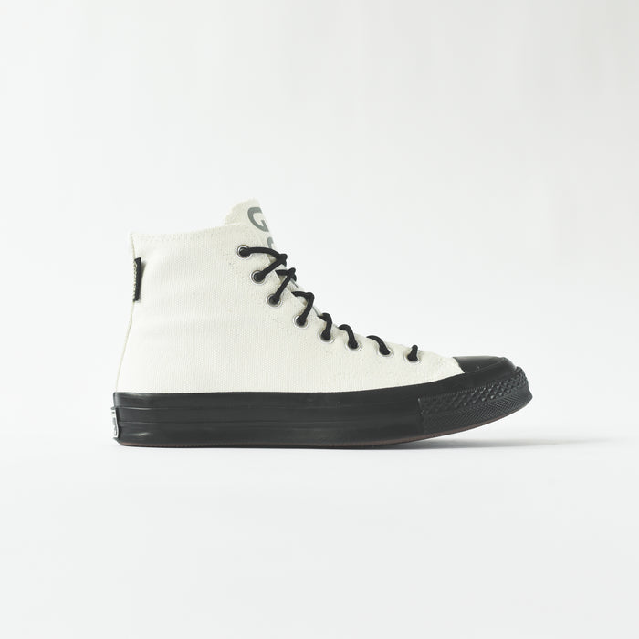 black converse with black sole