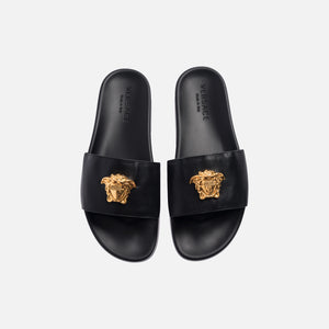 versace black and gold slides