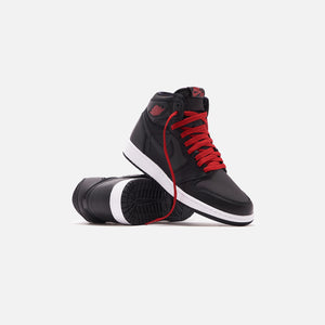 black and red jordans grade school