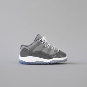 grey and white jordans 11