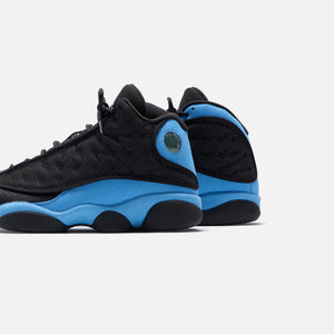 black and blue jordan 13