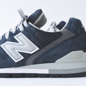 white and navy new balance