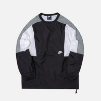 black grey and white nike windbreaker