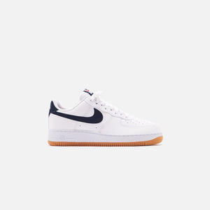 nike air force 1 sneakers with navy swoosh and gum sole