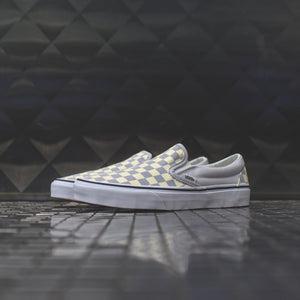 gray and white checkerboard vans