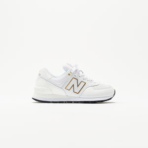 new balance white and gold