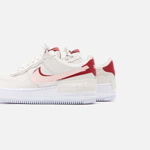 nike air force 1 pink and red swoosh