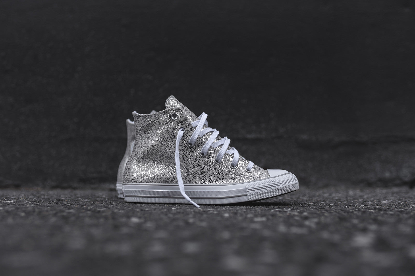 silver metallic high top converse