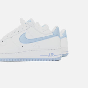 white and light blue air force ones